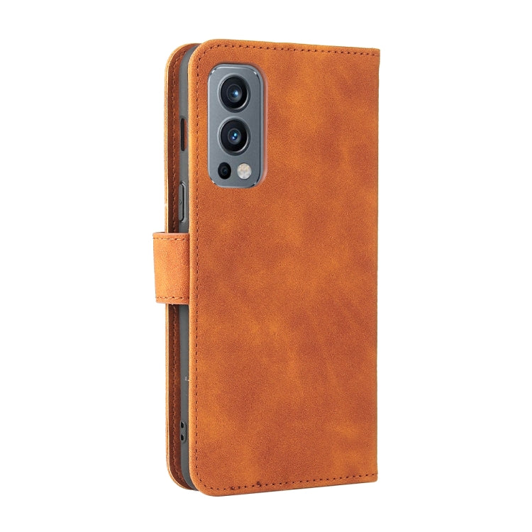 For OnePlus Nord 2 5G Solid Color Skin Feel Magnetic Buckle Horizontal Flip Calf Texture PU Leather Case with Holder & Card Slots & Wallet(Brown) - OnePlus Cases by buy2fix | Online Shopping UK | buy2fix