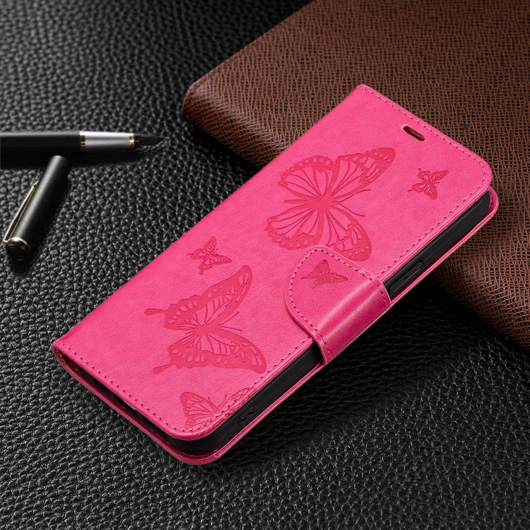 For iPhone 16 Plus Embossing Two Butterflies Pattern Leather Phone Case(Rose Red) - iPhone 16 Plus Cases by buy2fix | Online Shopping UK | buy2fix