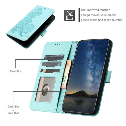 For Motorola Edge 5G 2024 Datura Flower Embossed Flip Leather Phone Case(Light Blue) - Motorola Cases by buy2fix | Online Shopping UK | buy2fix