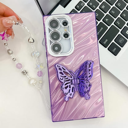 For Samsung Galaxy S25+ 5G Plating Glitter Lens Film Texture Butterfly Holder Wristband Phone Case(Purple Shell Pattern) - Galaxy S25+ 5G Cases by buy2fix | Online Shopping UK | buy2fix